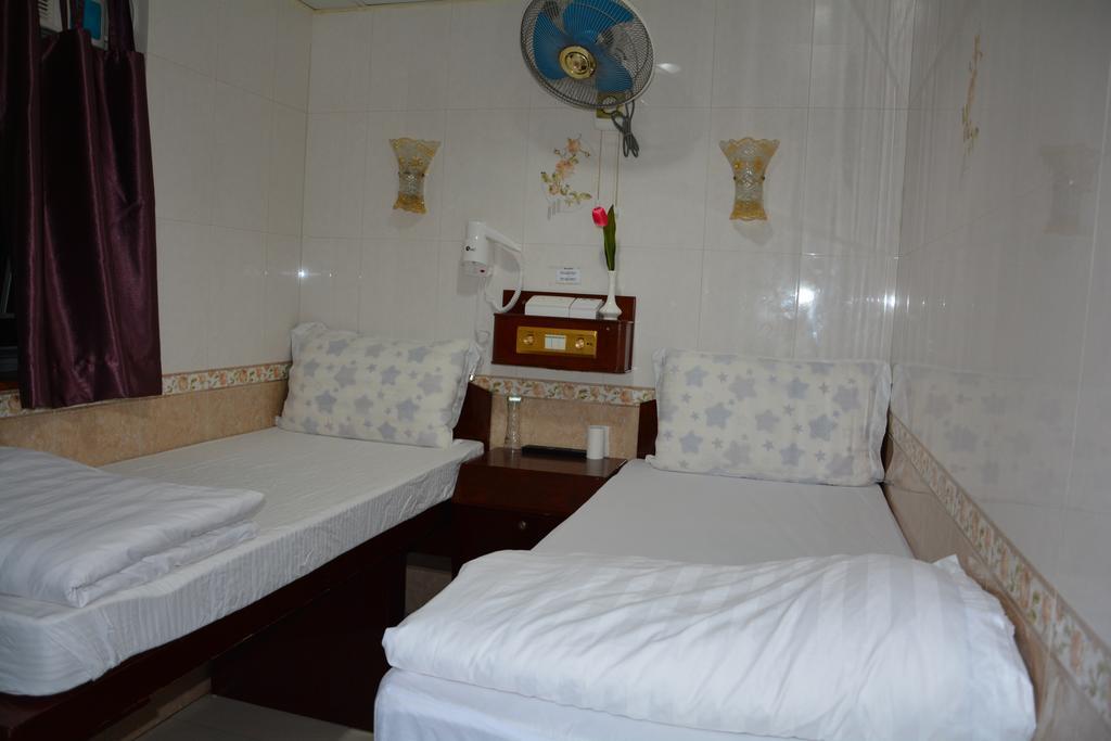 Everest Guest House Хонконг Стая снимка