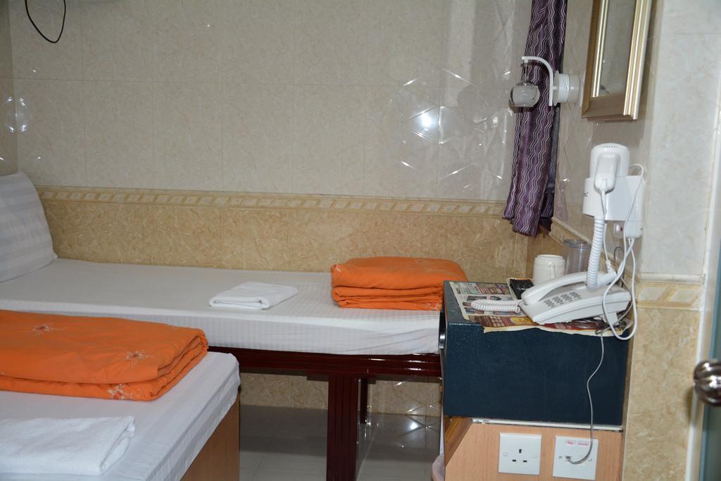 Everest Guest House Хонконг Стая снимка