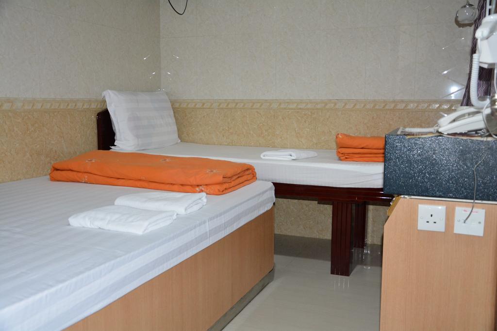 Everest Guest House Хонконг Стая снимка